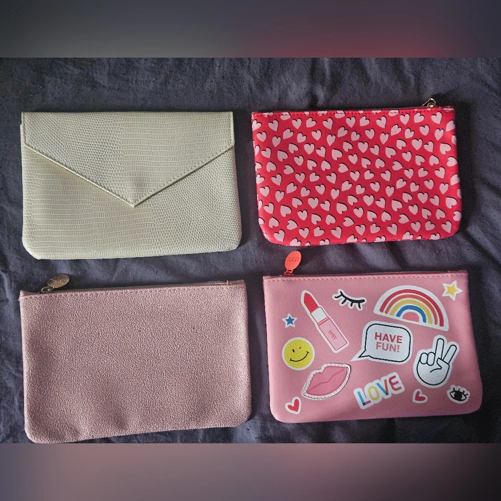 4 ipsy makeup/travel bags